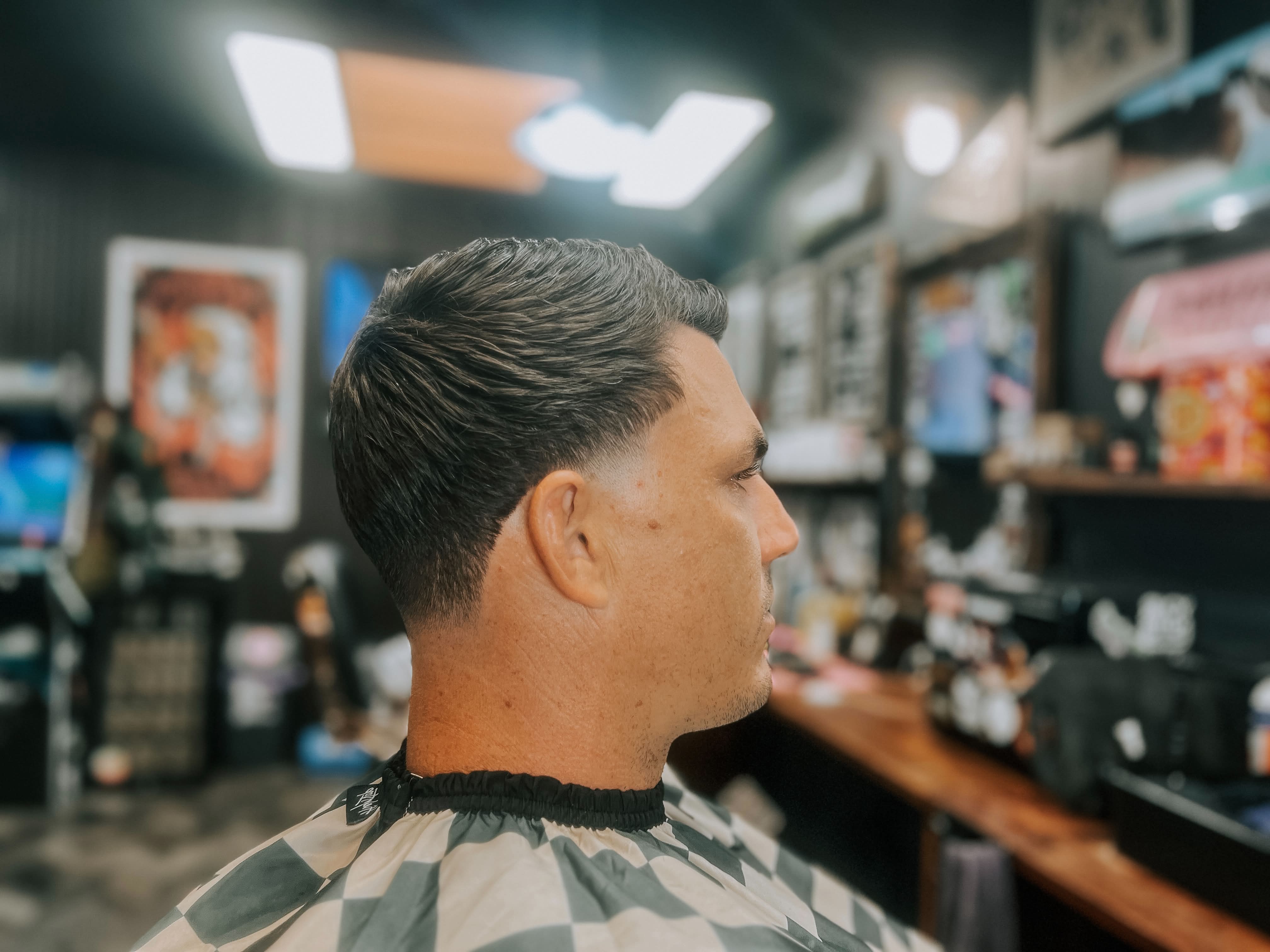 Haircut, side profile, shop background