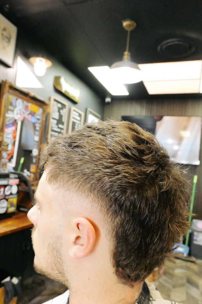 Haircut, rear three-quarter view
