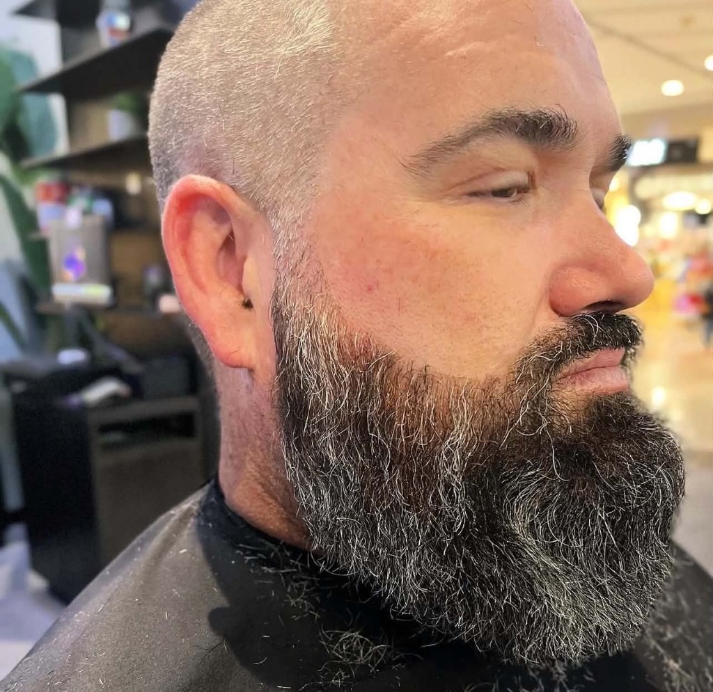 Short cut and full beard, three-quarter profile